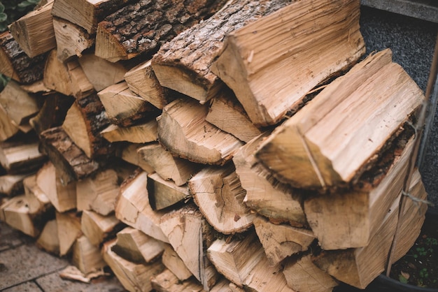 Round firewood texture, Pile of chopped firewood prepared for winter