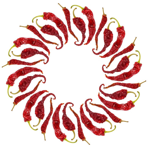 Round frame of chili peppers on white background