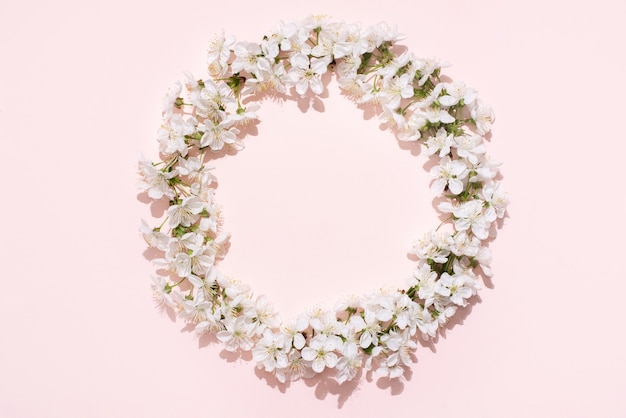 Round frame, wreath of white cherry flowers