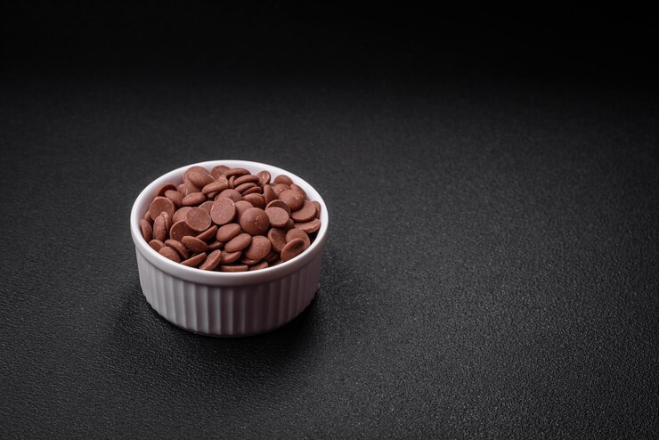 Photo デザートの原料としての甘い ⁇ 子チョコレートの丸い粒子
