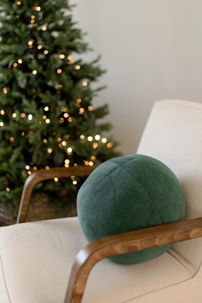 Round green cushion on the chair