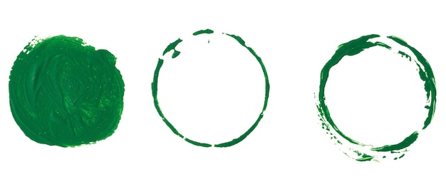 Round green paint imprint on white isolated background