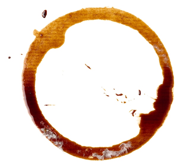 Photo round imprint of spilled black coffee on a white isolated background