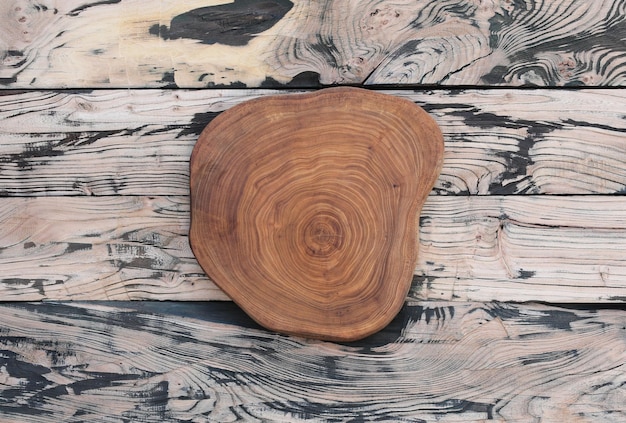 round kitchen board on an old wood table