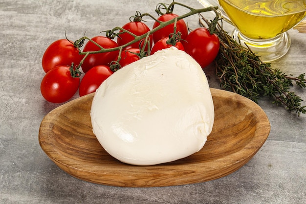 Foto round mozzarella young cheese ball