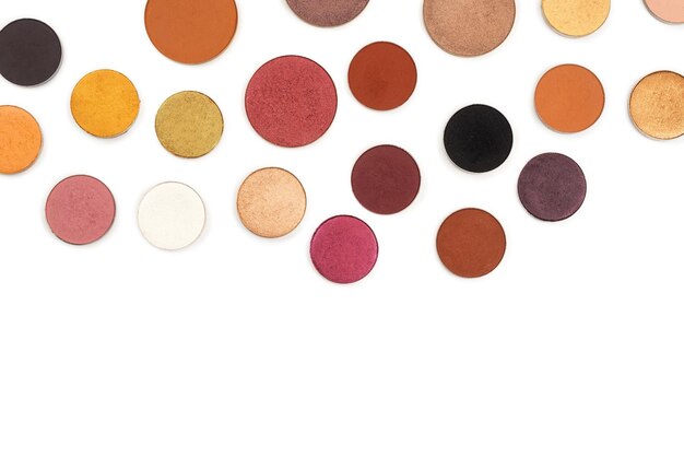 round multicolored make up eyeshadows isolated on white top view