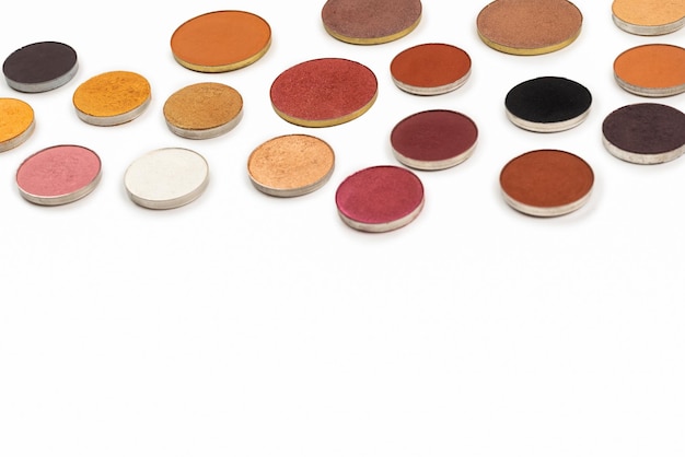 Photo round multicolored make up eyeshadows isolated on white