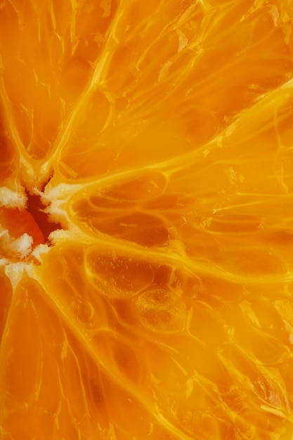 Round orange slices, in the form of texture and lanterns of fresh juicy slices