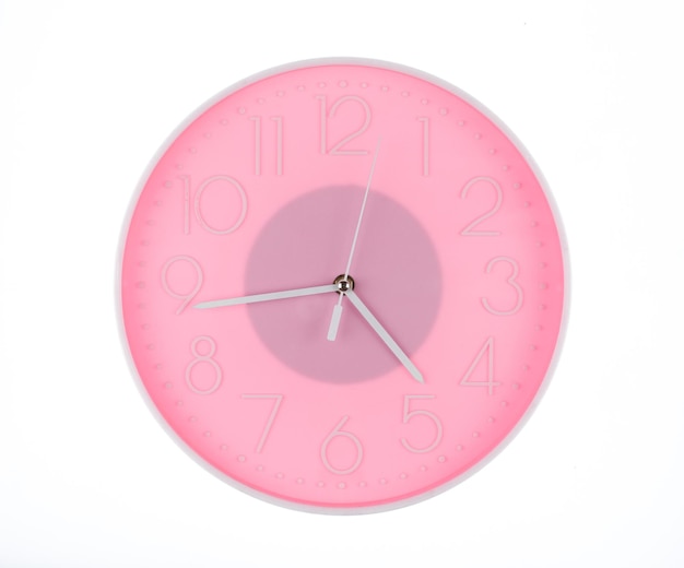 round pink wall clock isolated on white background