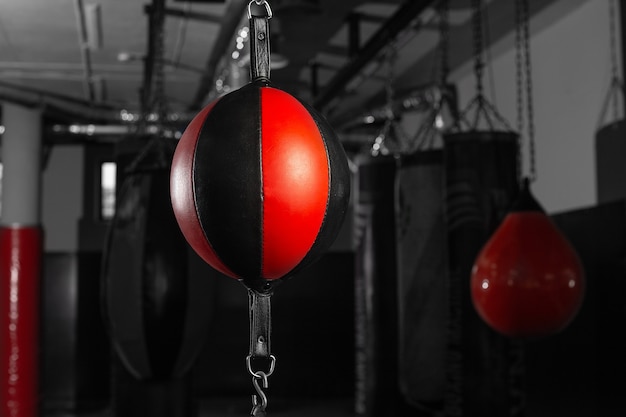 Round punching bag in the boxing gym