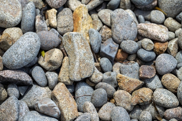 Round rocks and pebbles on the beach in australia