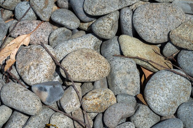 Round rocks and pebbles on the beach in australia