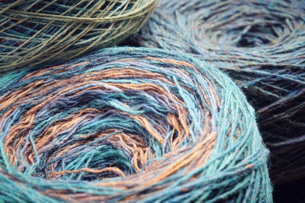 Round skeins of organic multicoloured lambswool yarn