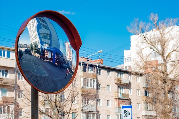 Round survey Spherical mirror on a pole to improve visibility of the road dangerous intersection