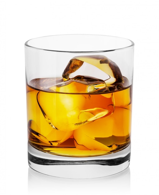 Round transparent glass of whiskey with ice