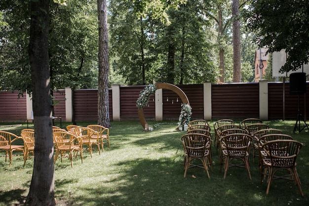 Round wedding arch in the park at the ceremony