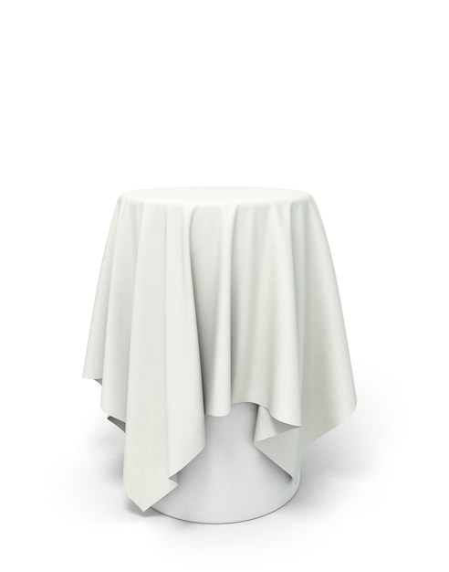 Photo round white tablecloth on the pedestal isolated on white