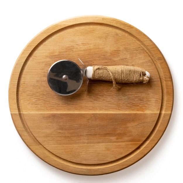 Round wooden pizza board and round knife