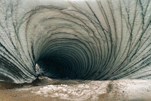 Rounded tunnel ice cave view from the inside Cueva de Jimbo Ushuaia Tierra del Fuego