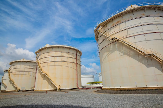 The row of big white tanks for petrol station and refinery