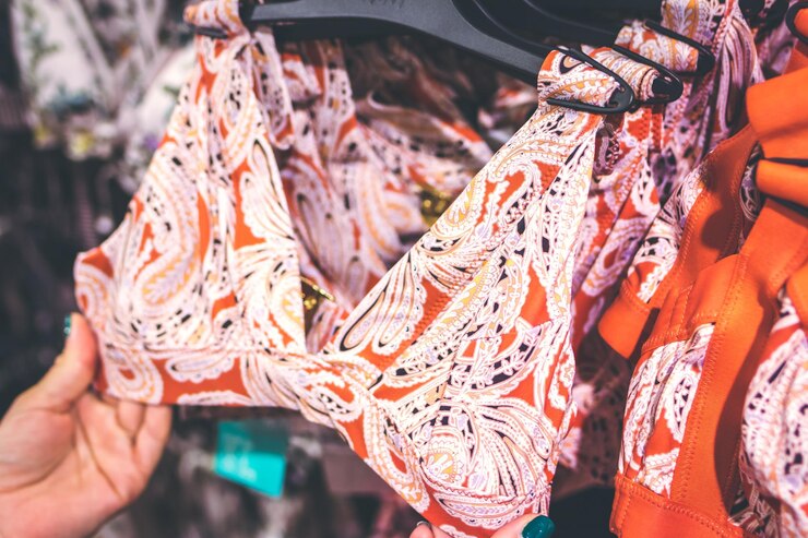 Photo row of bras hanging in lingerie underwear fashion store bra in shopping mall bali