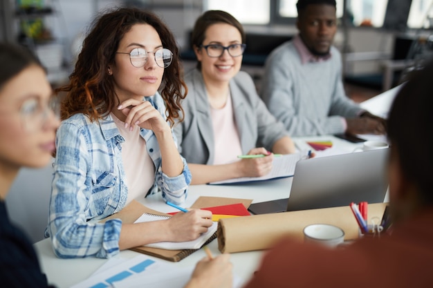 Row of Business People in Meeting