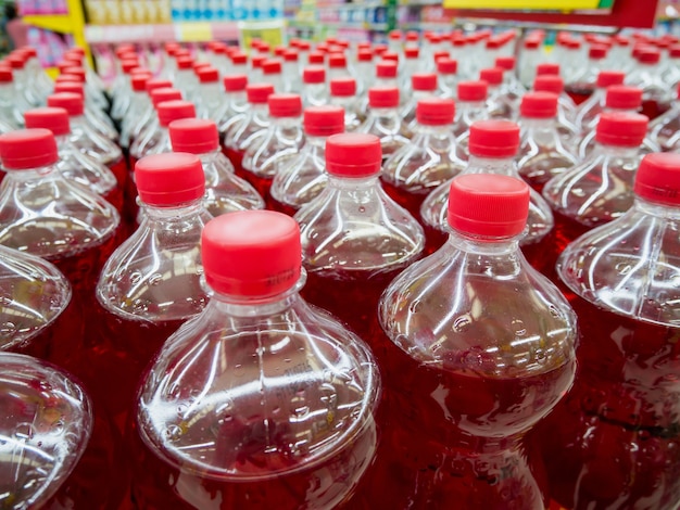 Row of carbonated soft drink bottles