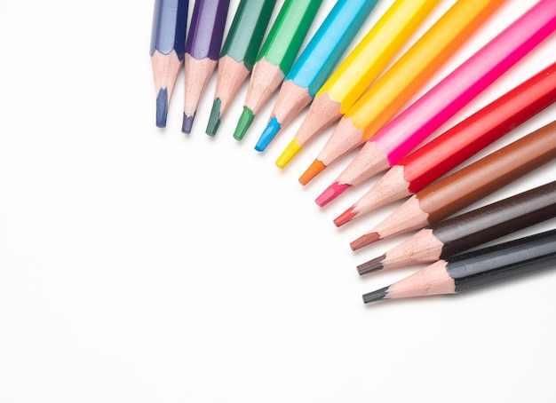 A row of colored pencils with one being labeled in the middle