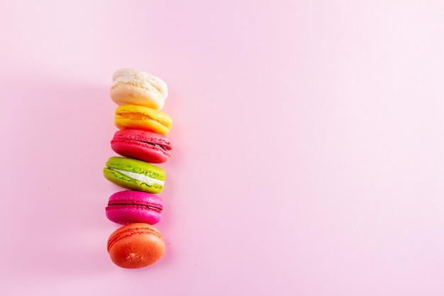 Row of colorful macaroon cookies