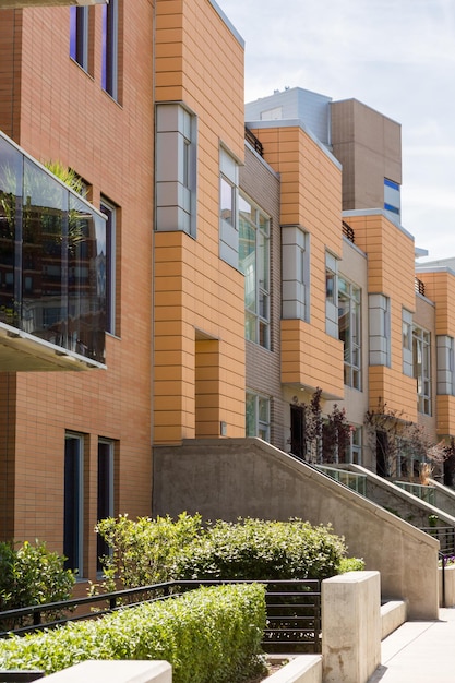 Row of contemporary townhomes at Riverside development.