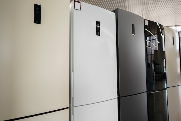 Row of fridges in household appliances store