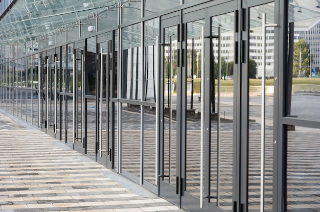 Row of glass doors of business centre