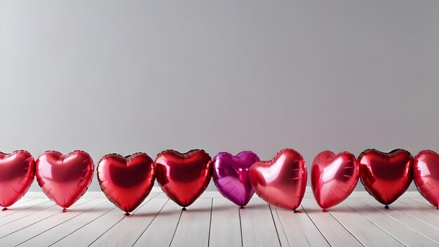 a row of heart shaped chocolates on a wooden floor