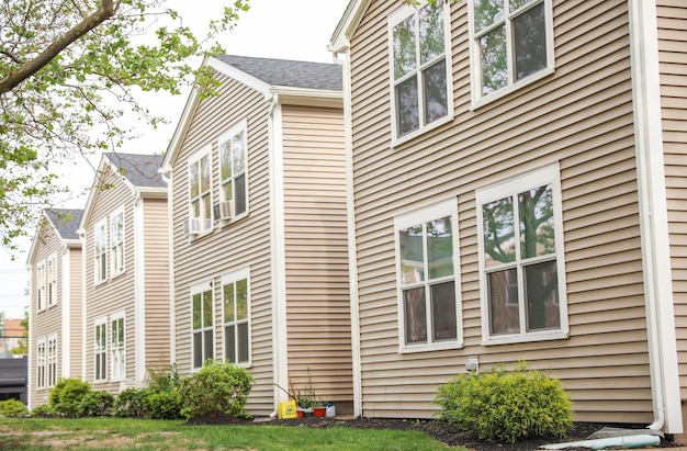 A row of houses with the word " home " on the side.