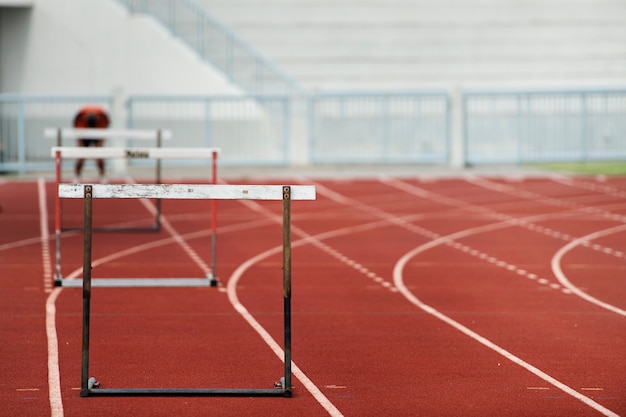 Photo row of hurdles for a track and field sprint hurdle race.