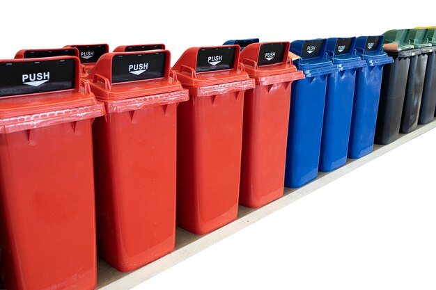 Row of large garbage bins, isolation on white background.