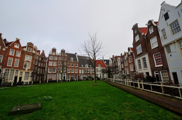 Row of medieval houses in Begijnhof Amsterdam Netherlands