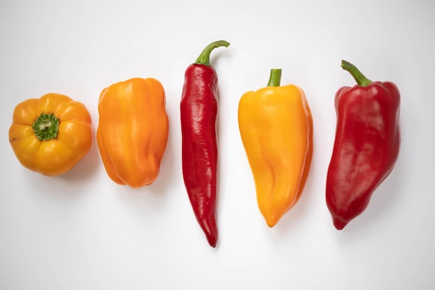 A row of peppers with one that says'the word " on it