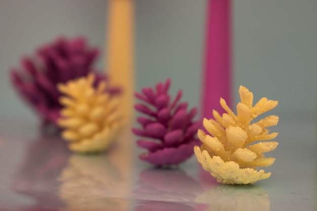 A row of pineapples are lined up on a table.