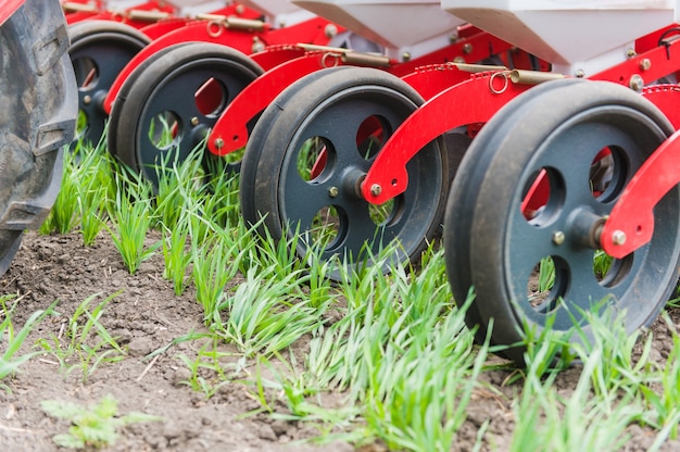 Photo row seeder wheels close up for farm