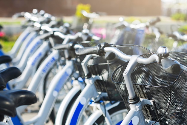 Row of similar bicycles for sharing outdoor free space