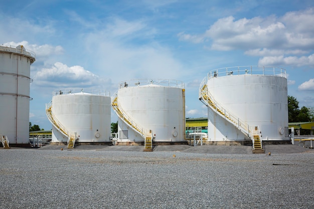 The row of small white tanks for petrol station and refinery spare part.