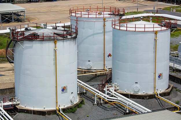 The row of small white tanks for petrol station and refinery