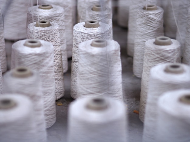 Row of textile threads industry