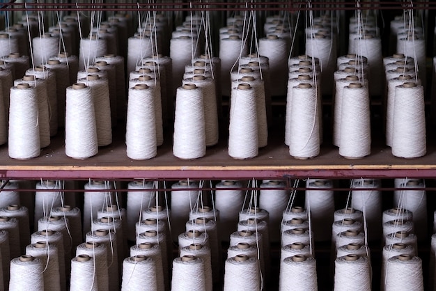 Row of textiles threads industry .