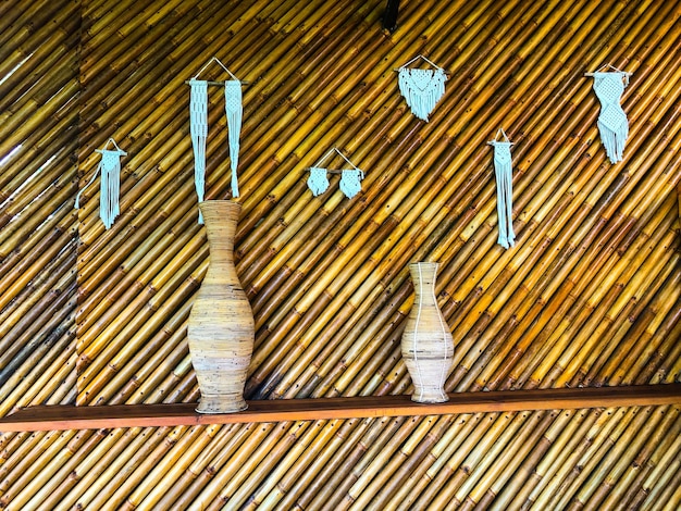 A row of vases with earrings