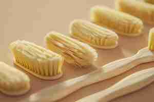 Photo a row of wooden sticks with the words toothbrush on them