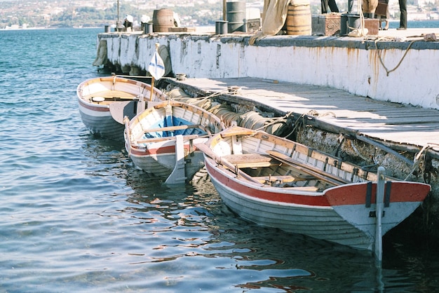 Rowing boats in the sea at the pier