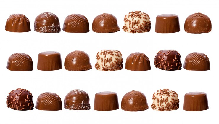 Photo rows of chocolate pralines