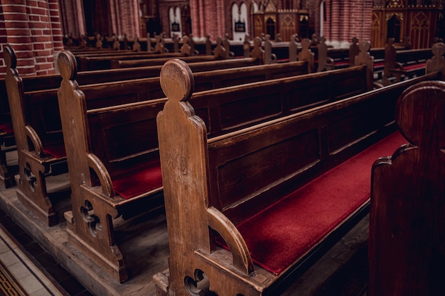 Rows of church benches at the old european catholic church